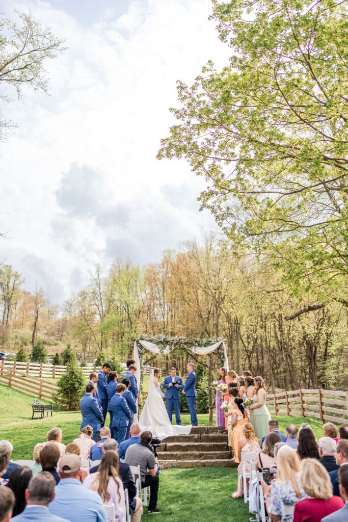 Outdoor wedding ceremony at Rivercrest Farms in Dover, Ohio.