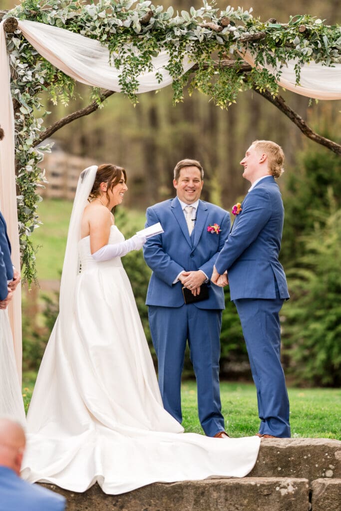 Couple shares vows at Rivercrest Farms in Dover, Ohio.