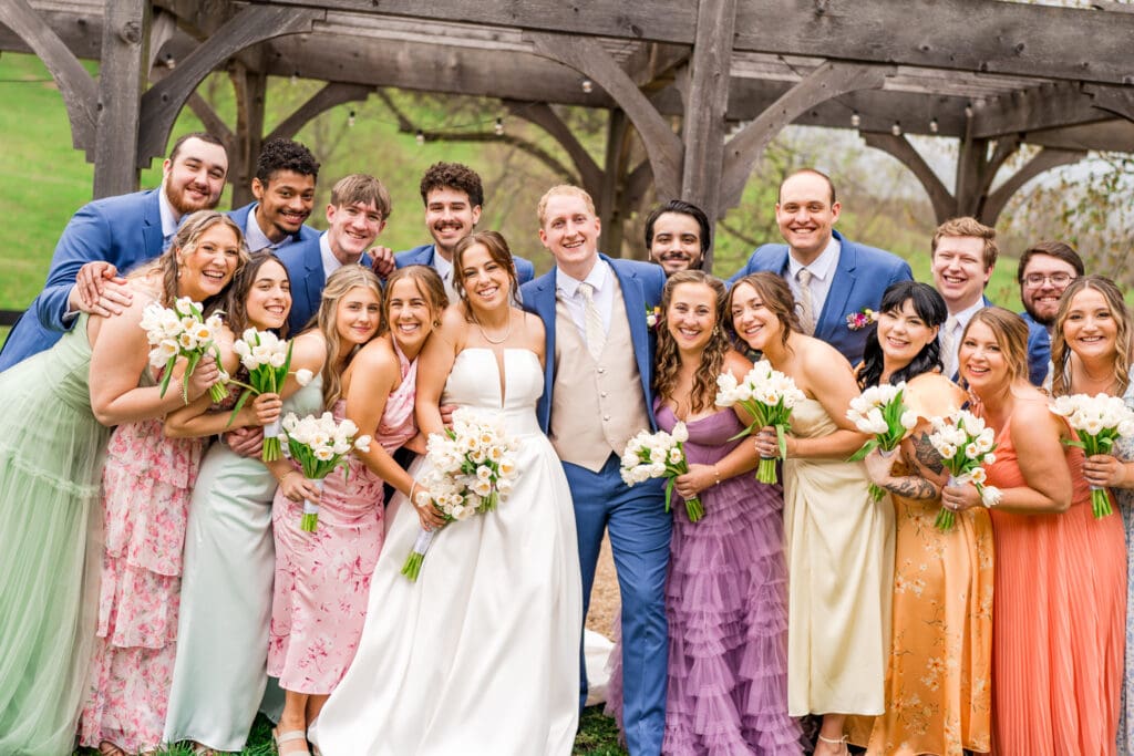 Large, colorful wedding party at Rivercrest Farms in Dover, Ohio.