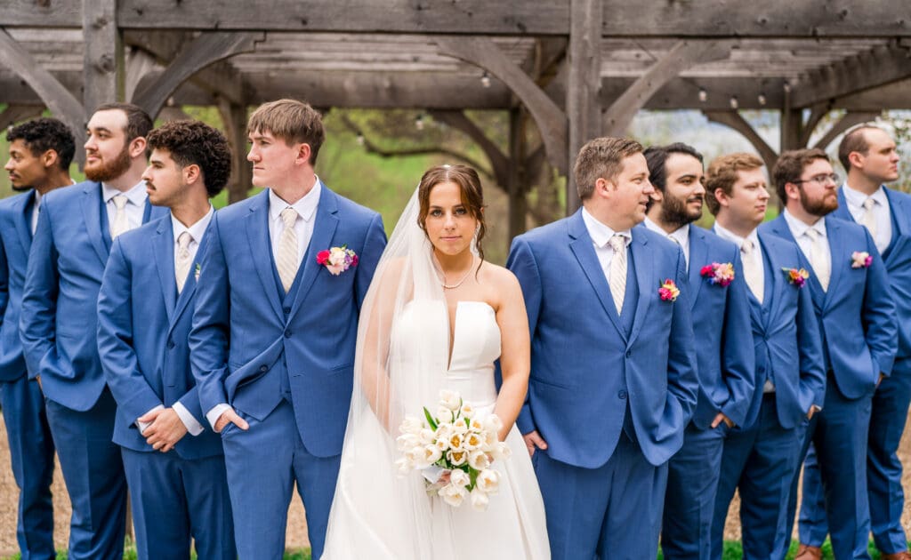 The bride with the groomsmen at Rivercrest Farms in Dover, Ohio.