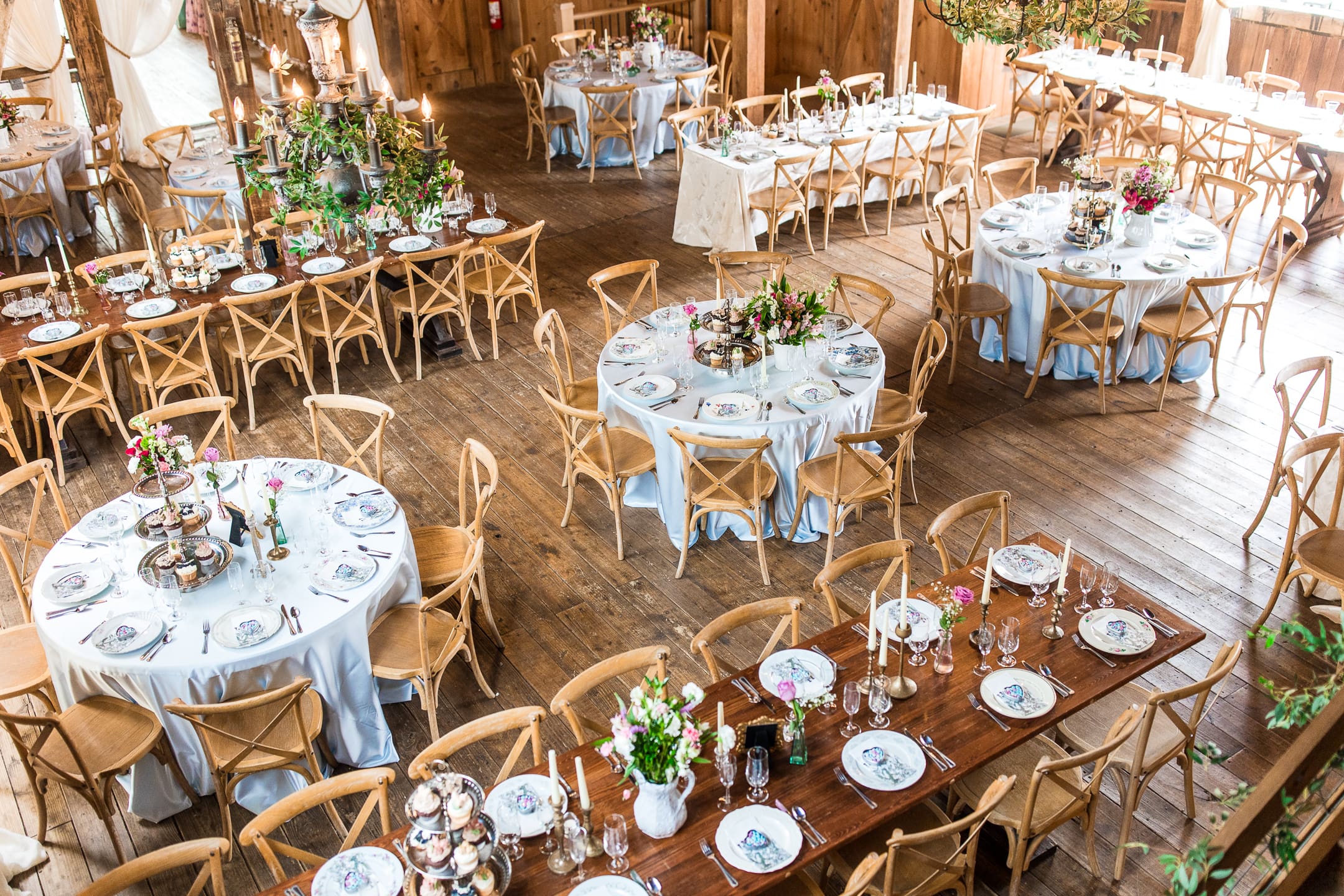Colorful, rustic garden party themed reception setup at Rivercrest Farms in Dover, Ohio.
