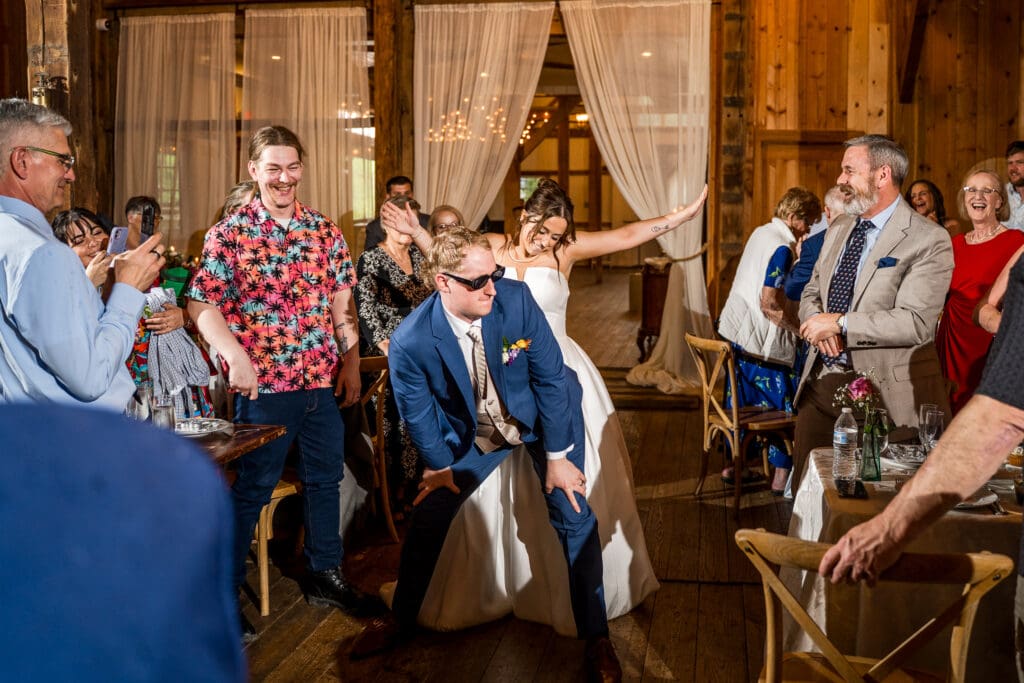 Couple dances as they enter their reception at Rivercrest Farms in Dover, Ohio.