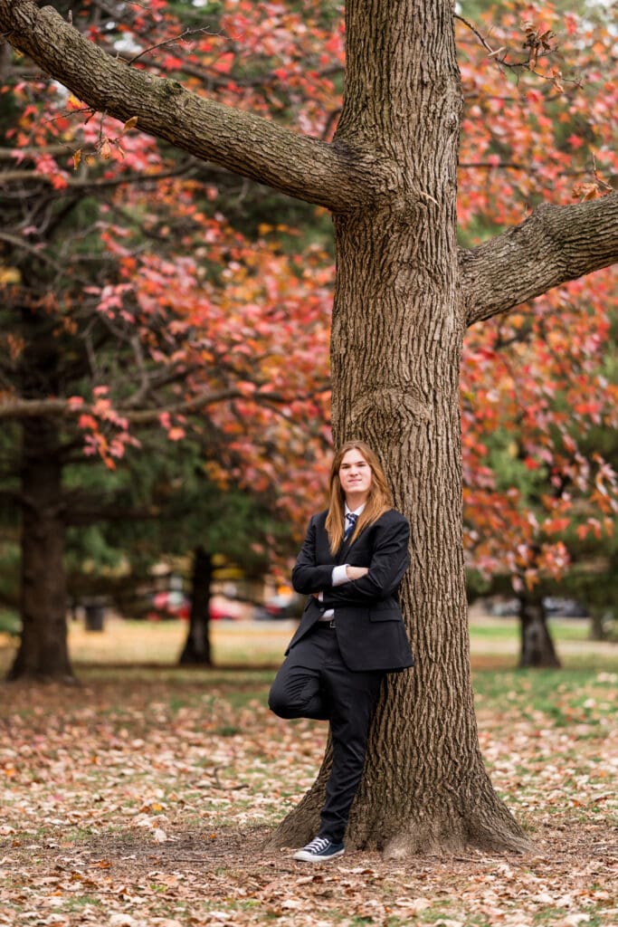 Senior boy in a suit during Fall at Goodale Park in Columbus, Ohio.