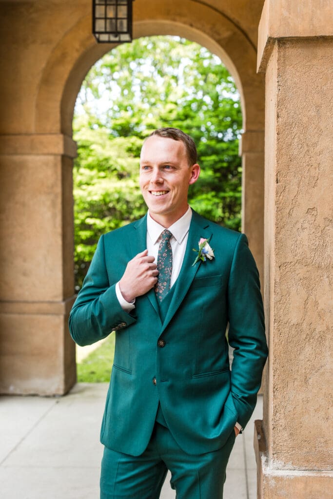 The groom dressed in green at the Club at Corazon.