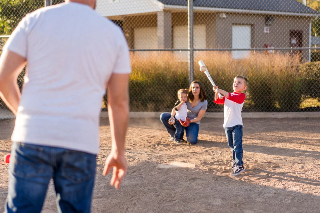 Family plays baseball together for a photoshoot in Canal Winchester, Ohio.