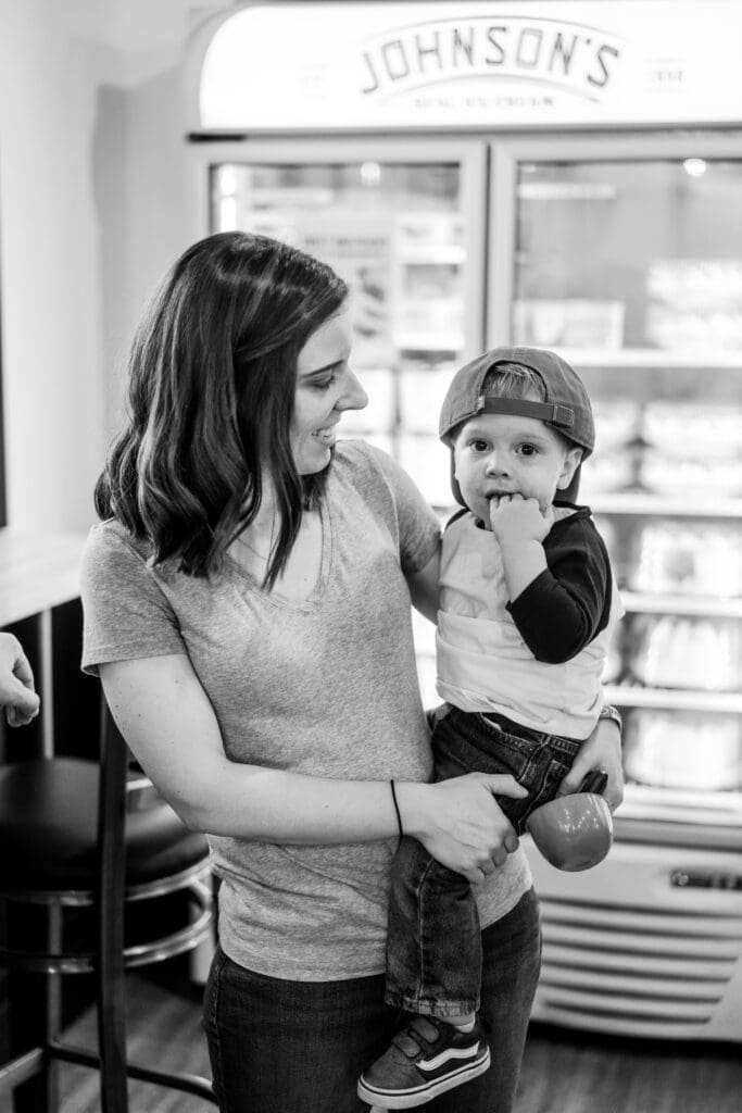 A mother holds her son inside Johnson's Ice Cream in Canal Winchester.