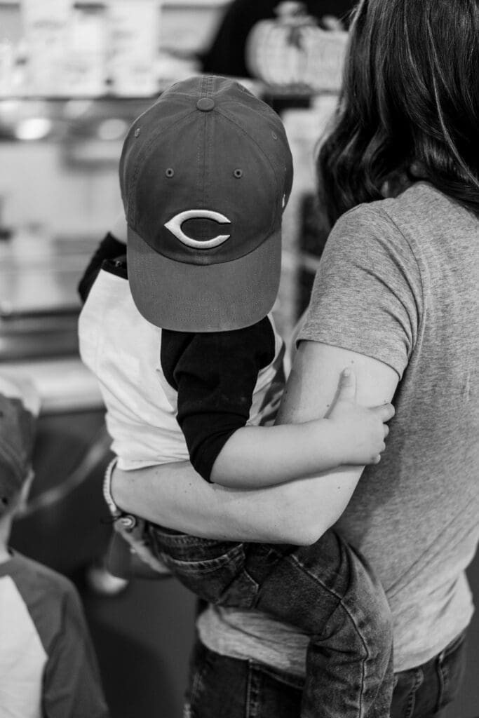 A mother holds her son inside Johnson's Ice Cream in Canal Winchester.