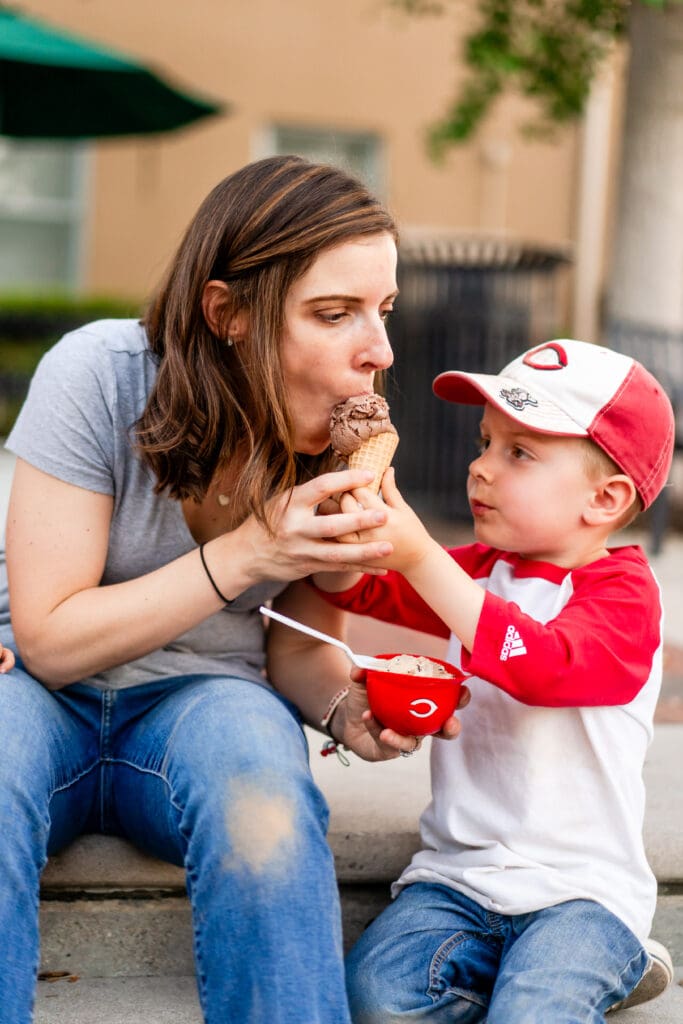 Little boy feeds his mom ice cream at Johnson's Ice Cream in Canal Winchester, Ohio.