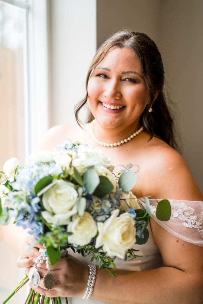 Bridal portrait by a window at the Estate at New Albany