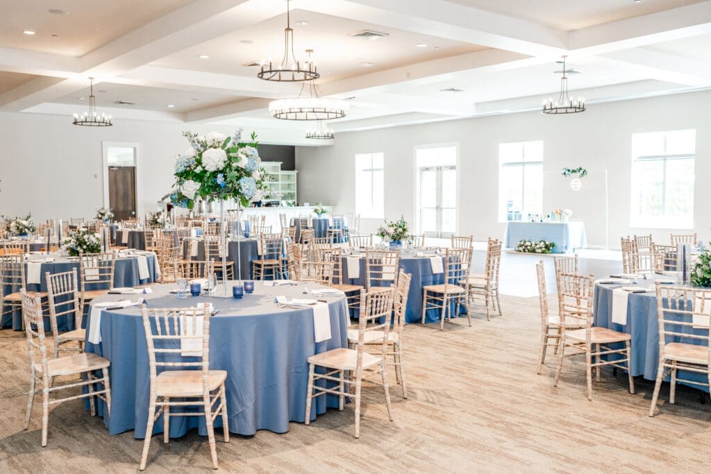 Blue and white decor reception setup at the Estate at New Albany.