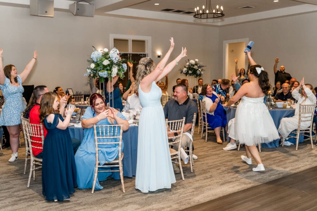 T-shirt toss during their reception entrance at the Estate at New Albany