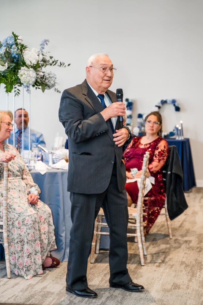 The bride's grandpa gives a speech
