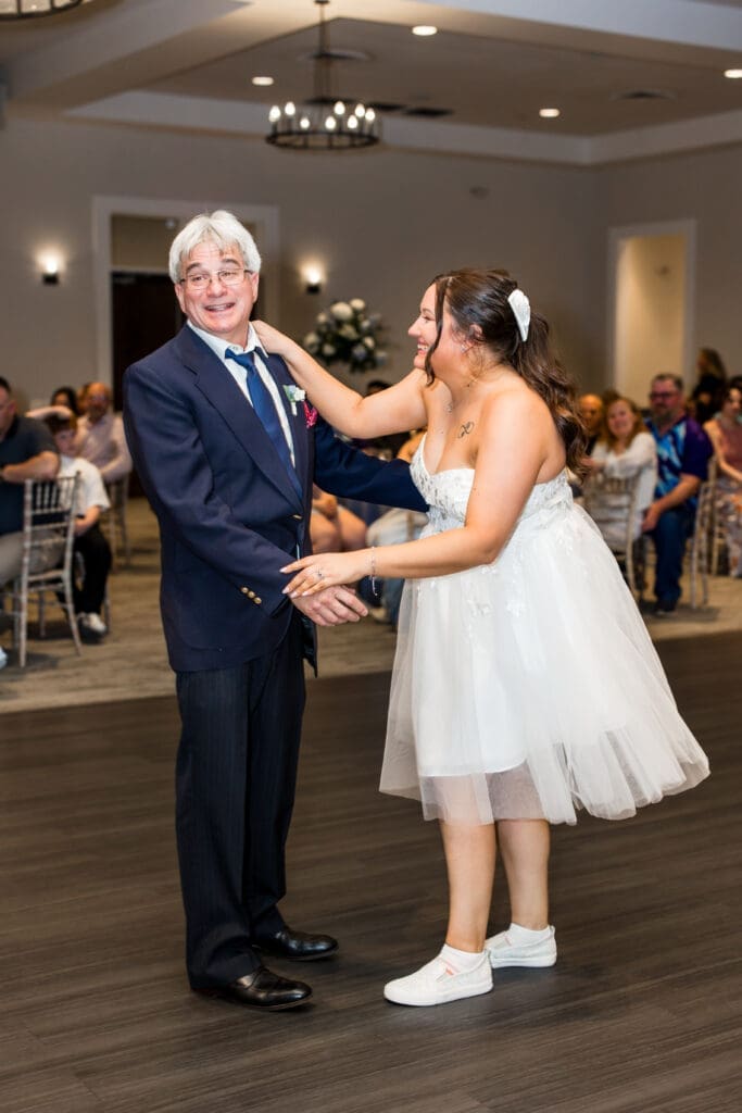 the bride and her uncle dance at the Estate at New Albany