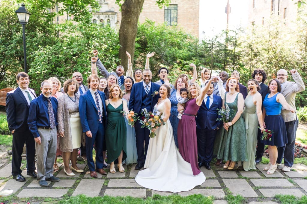Large portrait of all of their guests at their micro-wedding at the Kelton House in Columbus, Ohio.