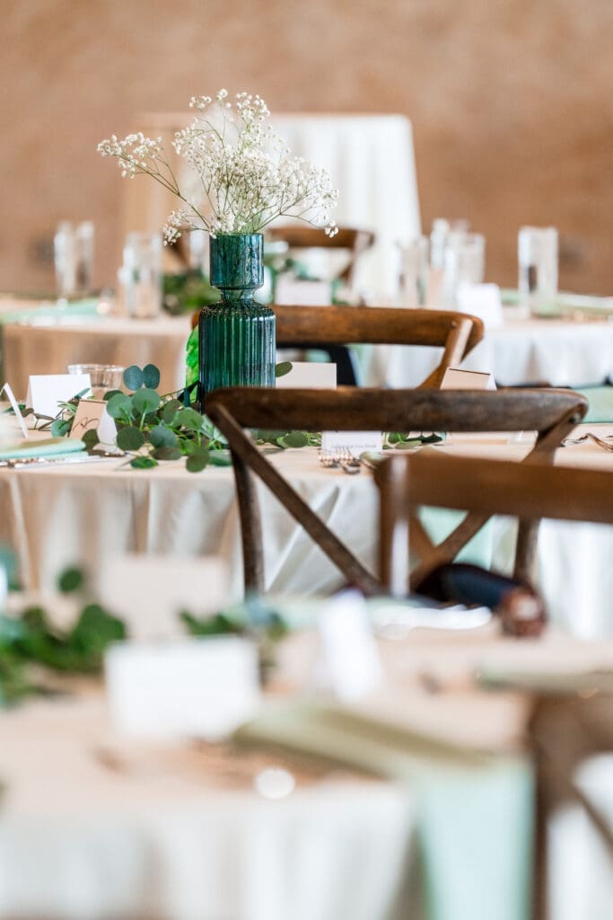 Brown, tan, and green wedding reception decor at the Columbus Zoo and Aquarium