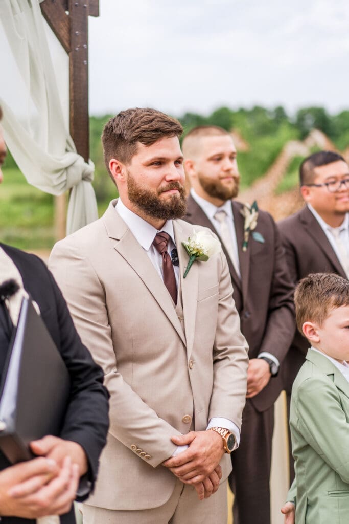 The groom's reaction to seeing his bride walk down the aisle at the Columbus Zoo and Aquarium Africa Event Center