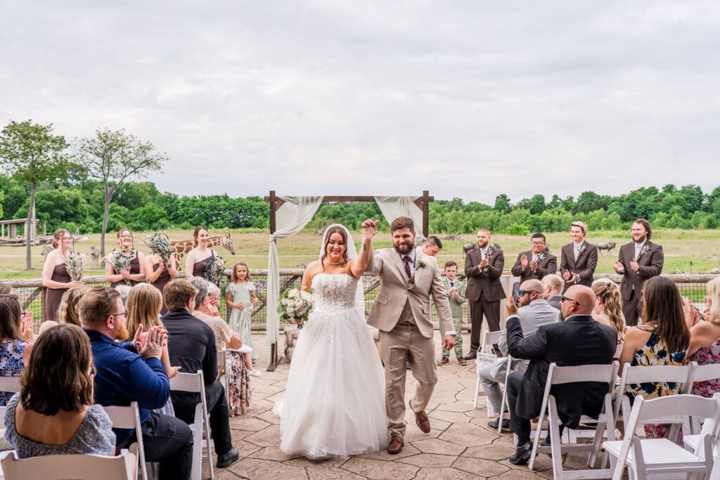 A joyful recessional at the Columbus Zoo and Aquarium Africa Event Center