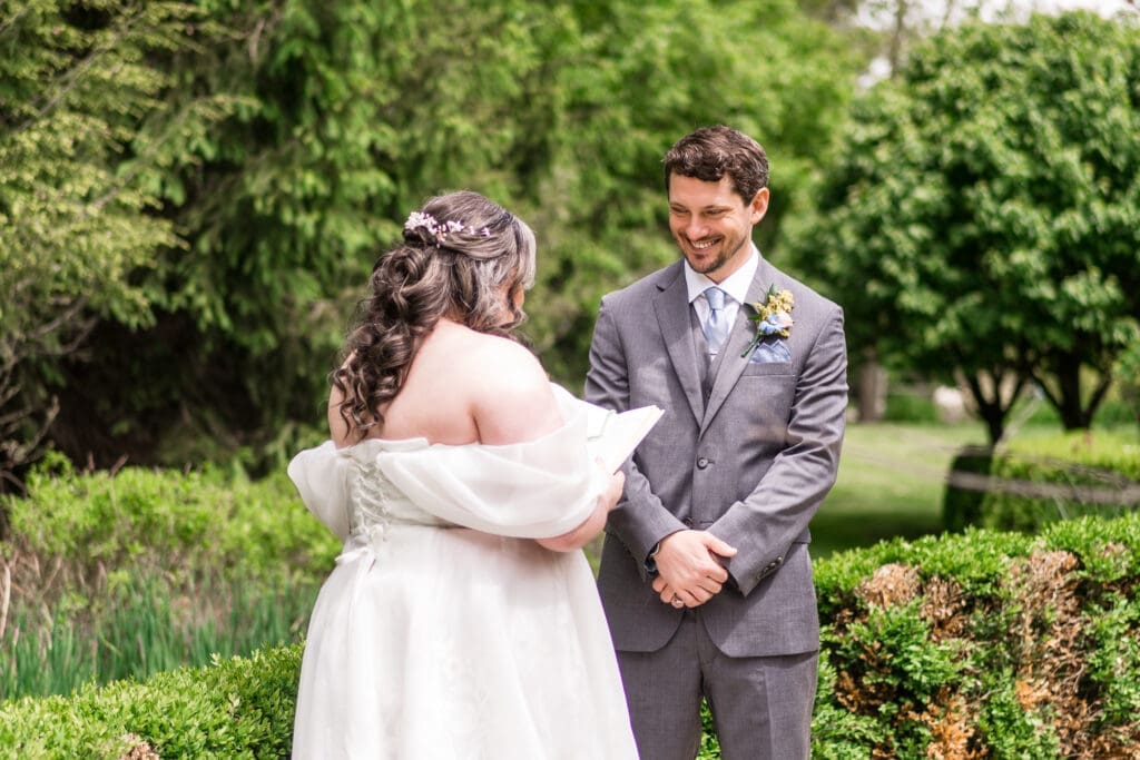 Bride and Groom first look Bridal portrait at the Dempsey Event Center in Delaware, Ohio.