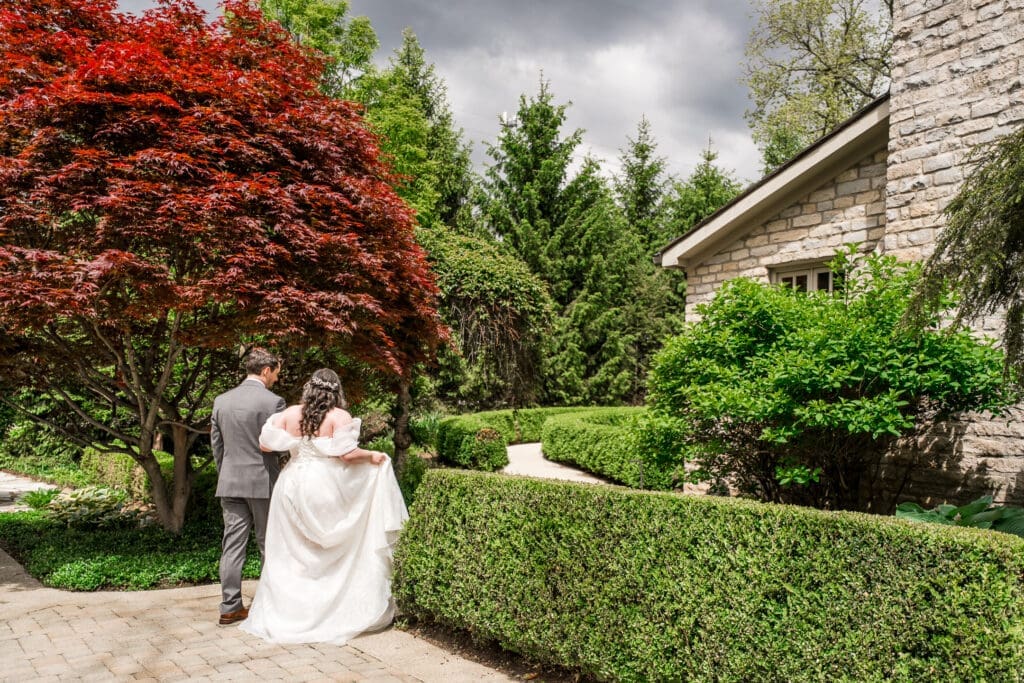 Candid photo of the wedding couple walking at the Dempsey Event Center in Delaware, Ohio.