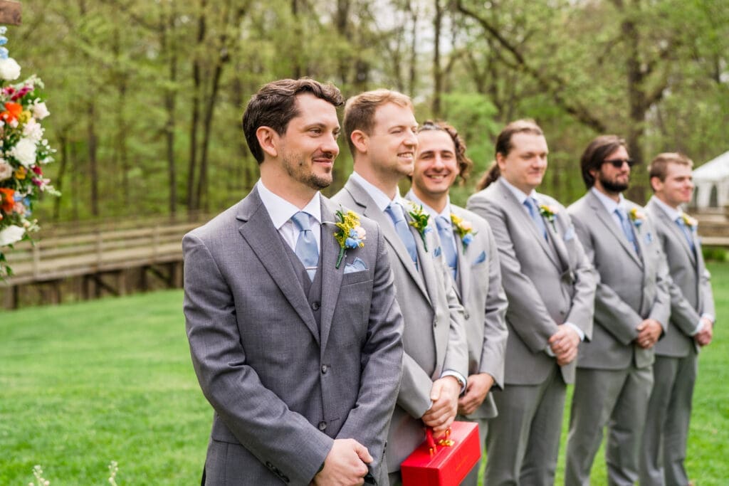 The groom's reaction to seeing his bride walk down the aisle at the Dempsey Event Center in Delaware, Ohio.