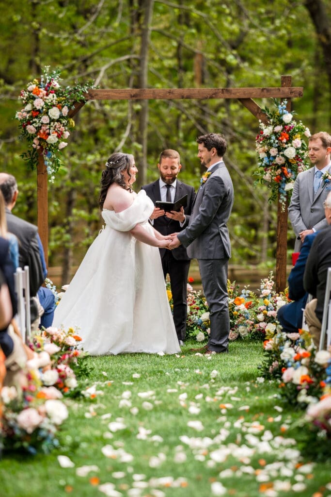 A colorful wedding ceremony on the lawn at the Dempsey Event Center in Delaware, Ohio.