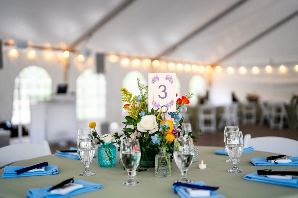Colorful wildflower reception decor at the Dempsey Event Center in Delaware, Ohio.