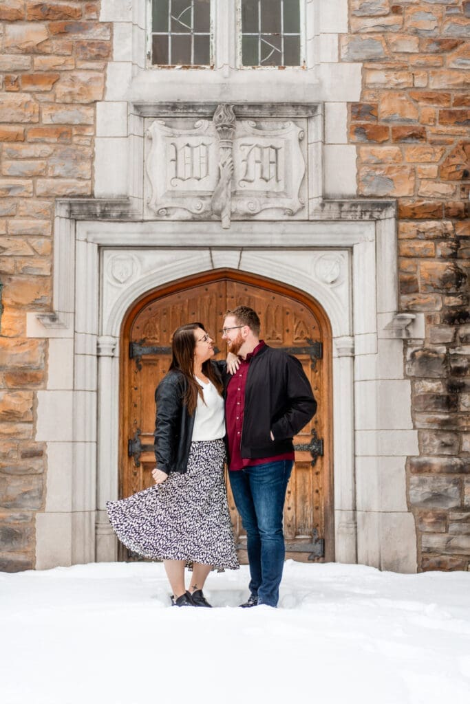 Winter engagement photo at Wagnalls Memorial Library.