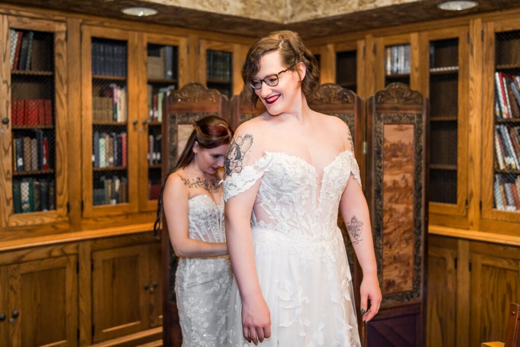 Two brides getting ready at Wagnalls Memorial Library in Lithopolis Ohio