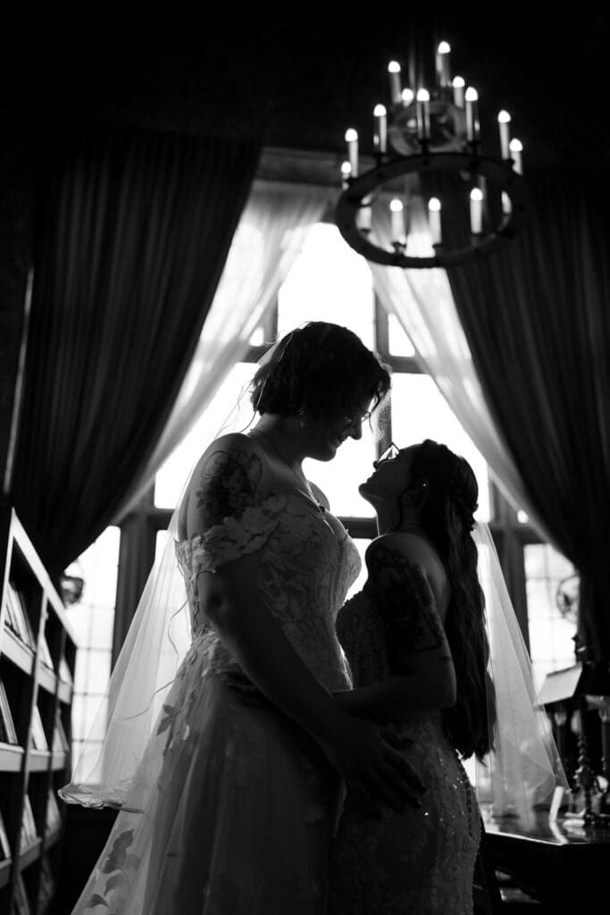 Couple portrait of two brides at a Columbus Ohio LGBTQ+ wedding at Wagnalls Memorial Library