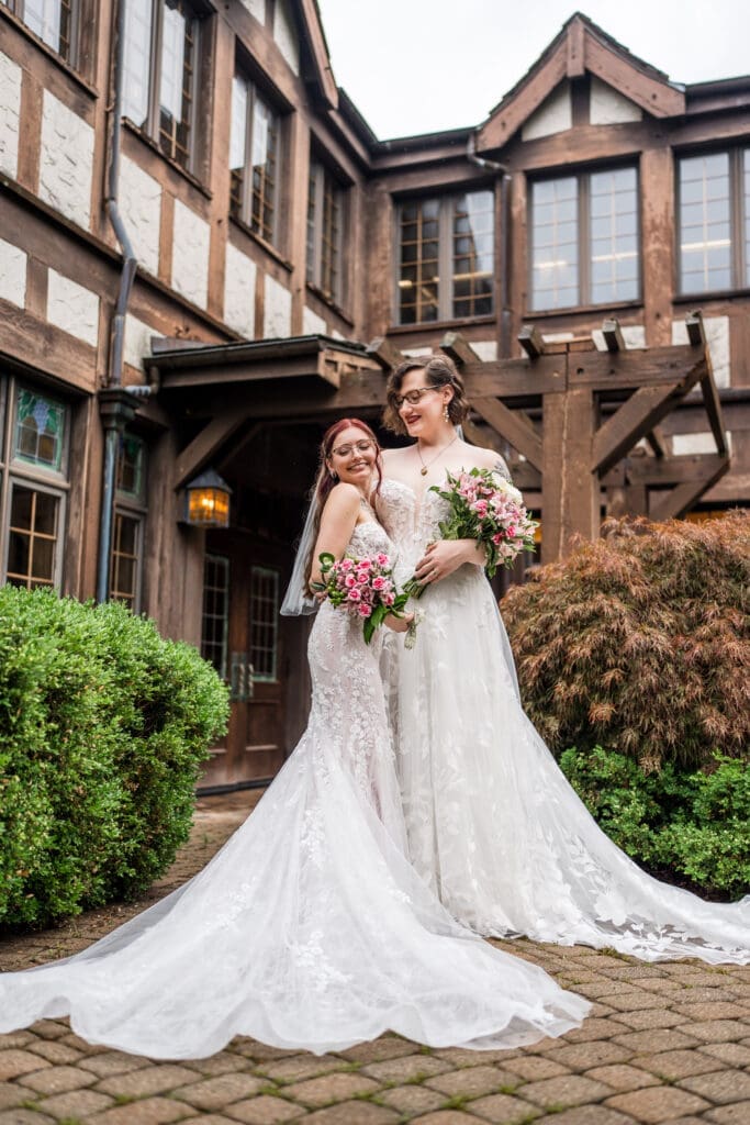 Couple portrait of two brides at a Columbus Ohio LGBTQ+ wedding at Wagnalls Memorial Library
