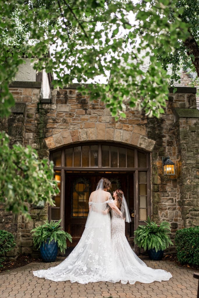 Couple portrait of two brides at a Columbus Ohio LGBTQ+ wedding at Wagnalls Memorial Library