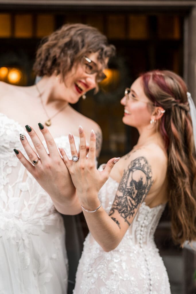 Couple portrait of two brides at a Columbus Ohio LGBTQ+ wedding at Wagnalls Memorial Library