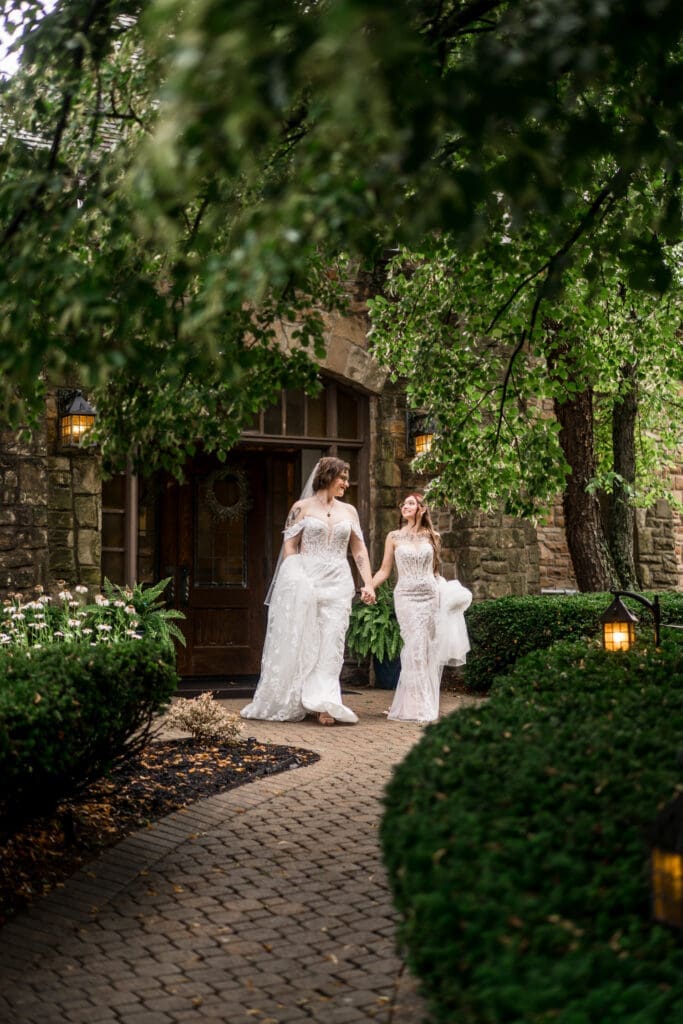 Couple portrait of two brides at a Columbus Ohio LGBTQ+ wedding at Wagnalls Memorial Library
