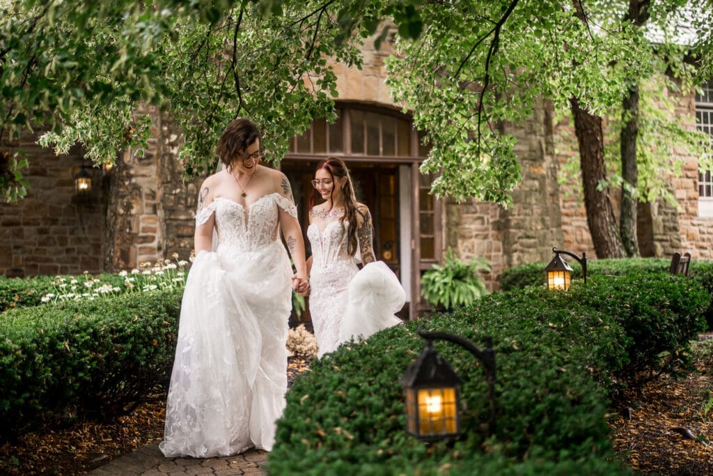 Couple portrait of two brides at a Columbus Ohio LGBTQ+ wedding at Wagnalls Memorial Library