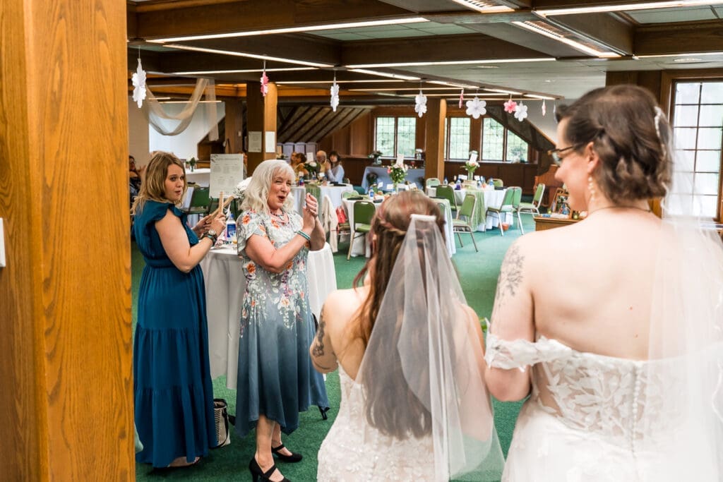 Candid moment at a Columbus Ohio LGBTQ+ wedding at Wagnalls Memorial Library