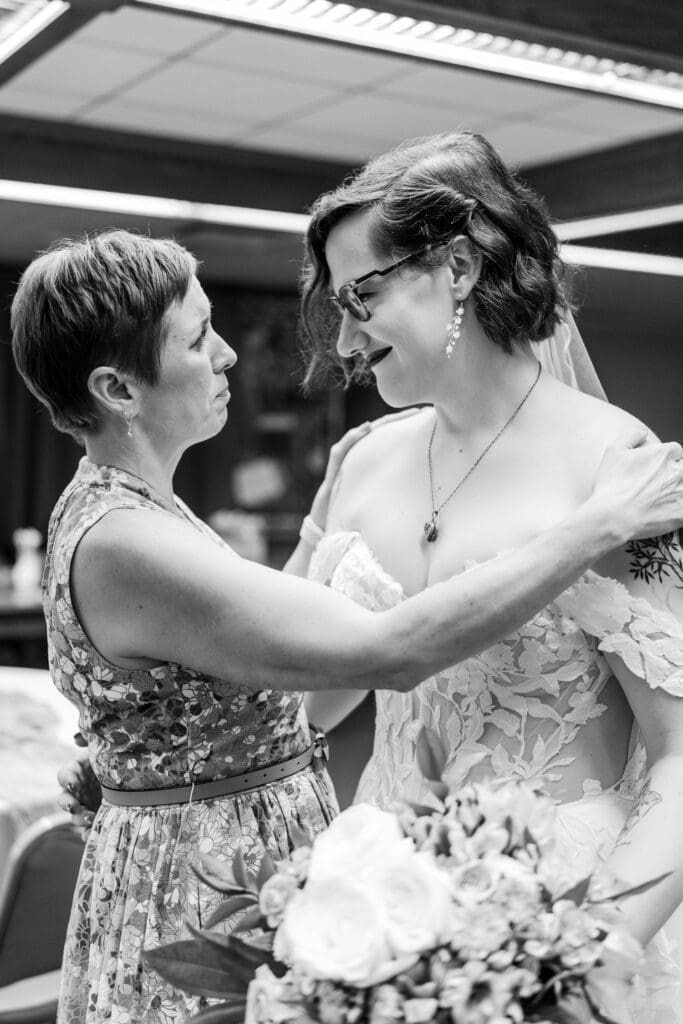 Candid moment at a Columbus Ohio LGBTQ+ wedding at Wagnalls Memorial Library