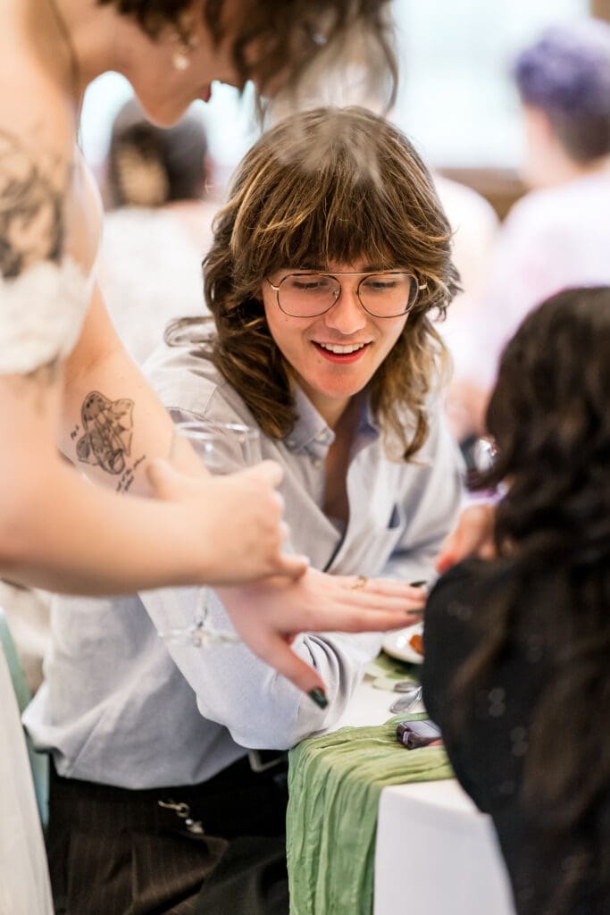Candid moment at a Columbus Ohio LGBTQ+ wedding at Wagnalls Memorial Library