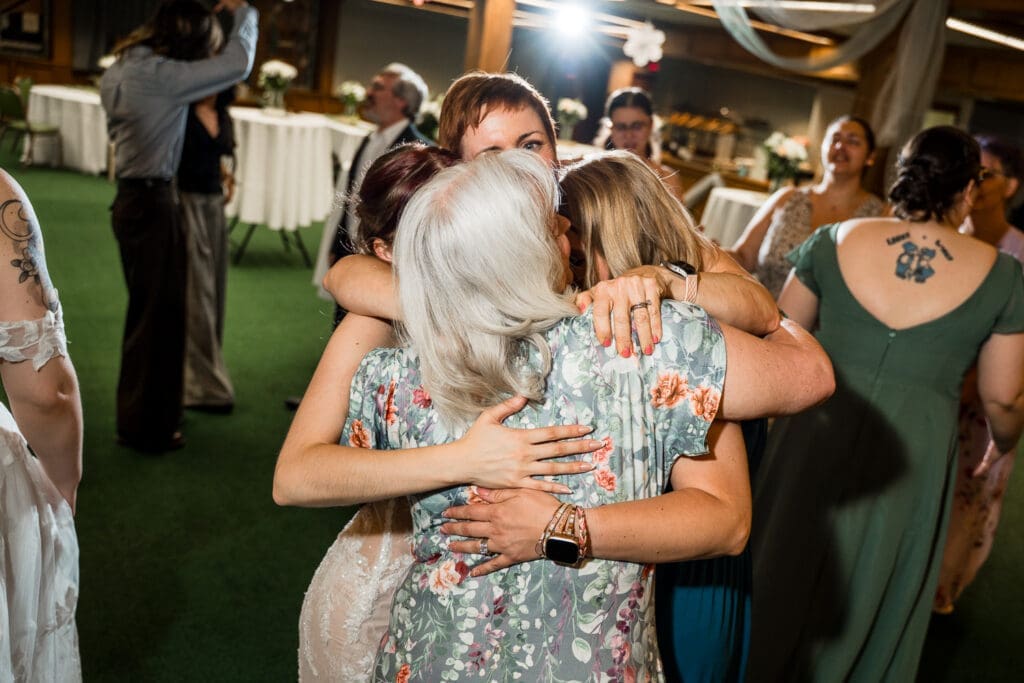 Candid moment at a Columbus Ohio LGBTQ+ wedding at Wagnalls Memorial Library