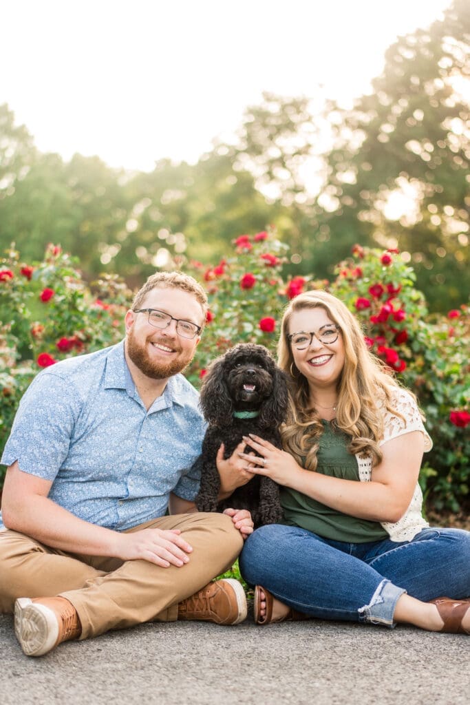 Engagement photos at the Columbus Park of Roses with their dog.