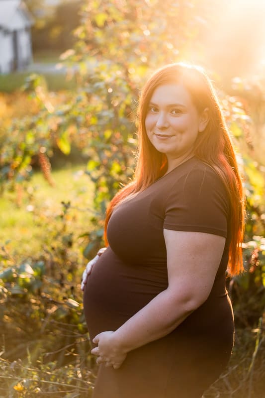 Golden hour maternity photos in a flower field in Pataskala, Ohio.