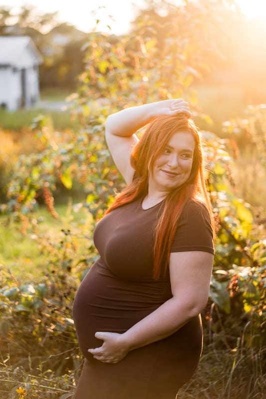 Golden hour maternity photos in a flower field in Pataskala, Ohio.