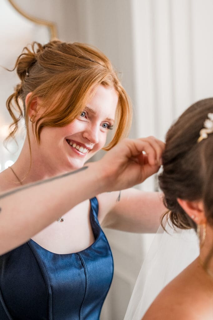 Bride getting ready at a wedding a Pinnacle Golf Course in Grove City, Ohio.