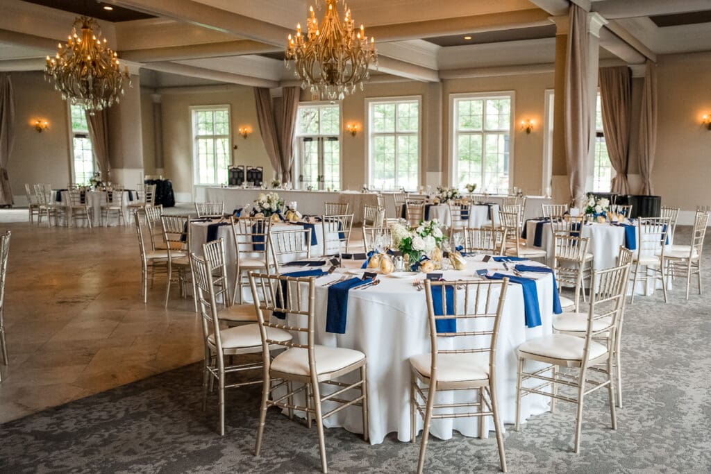 Navy and gold reception details at a wedding a Pinnacle Golf Course in Grove City, Ohio.