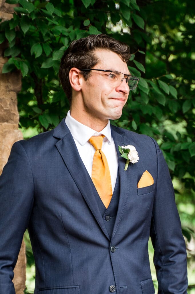 Groom reaction at their wedding ceremony at Pinnacle Golf Club in Grove City, Ohio.