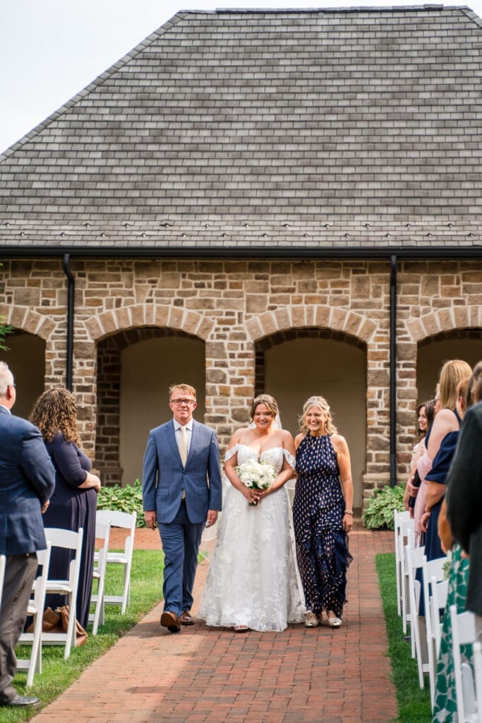 Bride processional at a wedding ceremony at Pinnacle Golf Club in Grove City, Ohio.