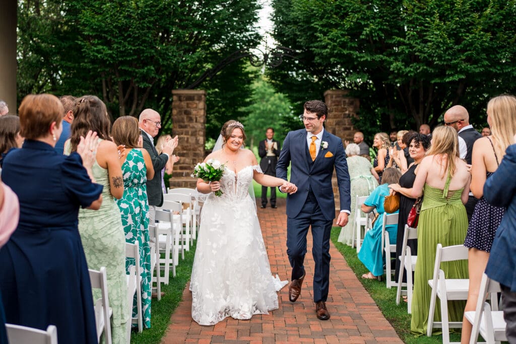 Outdoor wedding ceremony recessional at Pinnacle Golf Club in Grove City, Ohio.
